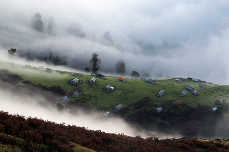 fog, foggy, grass, hill, houses, landscape, mist