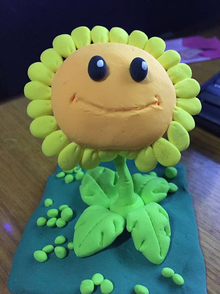 Sonnenblume, Ton-Skulptur, Spielzeug