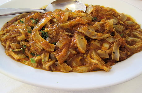 Sepia, vis, schaal-en schelpdieren, groente saus, Italië