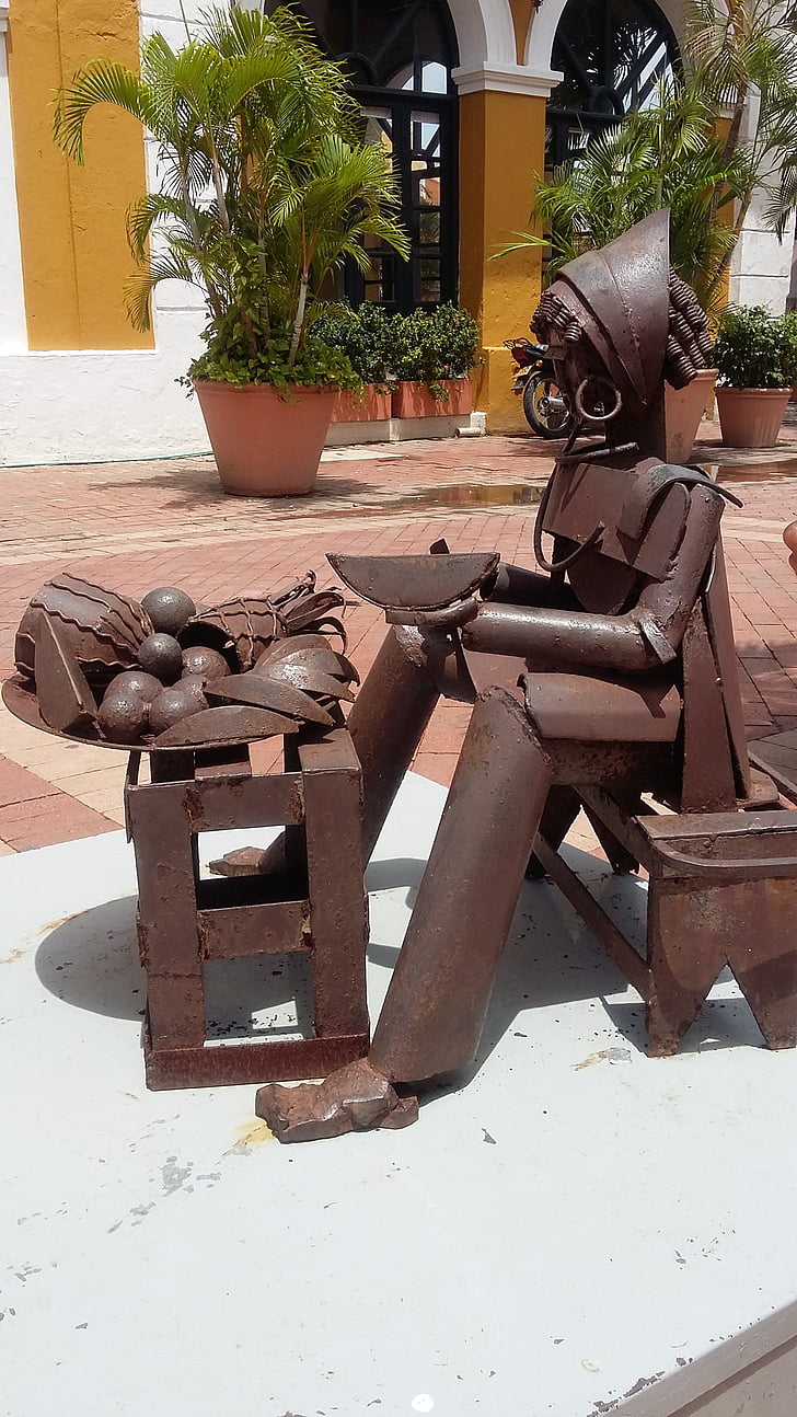 iron statue, greengrocer, cartagena, colombia