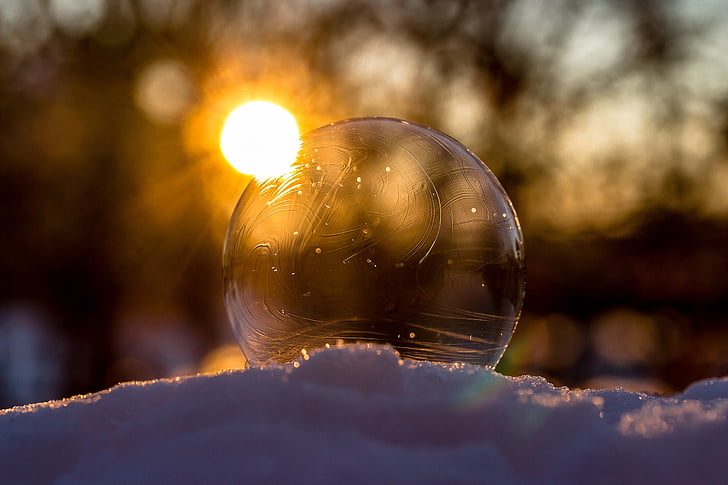 frozen bubble, soap bubble, slightly frozen, winter, sunbeam, sun, landscape