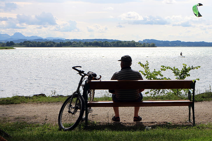 person, man, bench, bank, lake, waters, individually