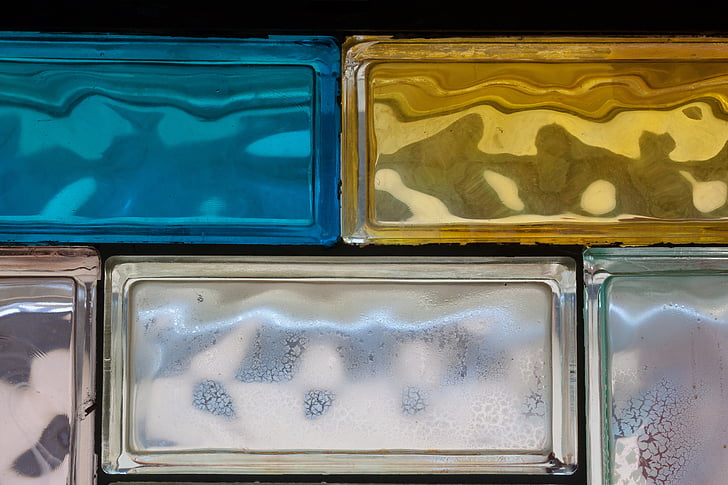 glass blocks, rectangular components, blue, yellow, pink, bad, old