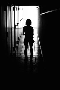 silhouette, photo, woman, standing, along, empty, hallway