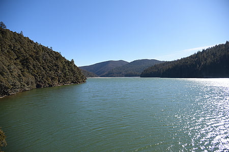 in yunnan province, outdoor, blue sky, lake