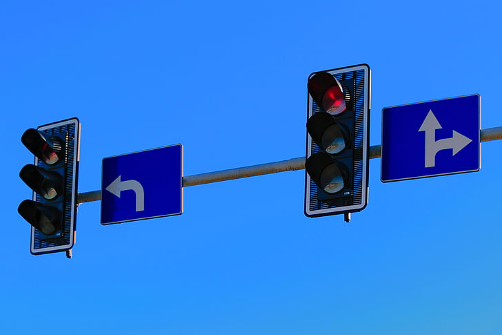 arrows, blue sky, clear sky, lights, red light, road sign, sign