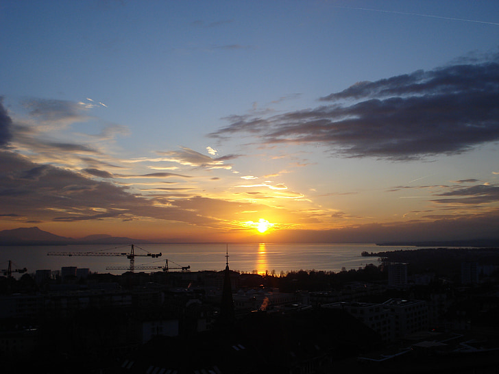 Genèvesjön, solnedgång, Lausanne, Schweiz, solen