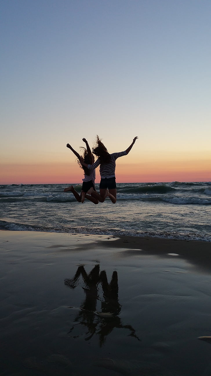 best friends, sunset, beach, jumping, cheer