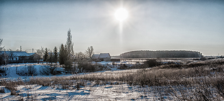 Vinter, solen, landskapet