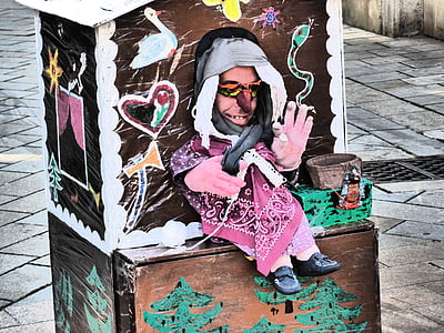 street theater, witch's house, puppet show