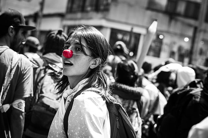 red nose, color splatter, joy, women, march, colombia, peace