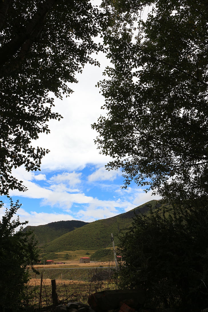 xinduqiao, Tibet, cel blau i núvols blancs, muntanya, hora de sortida