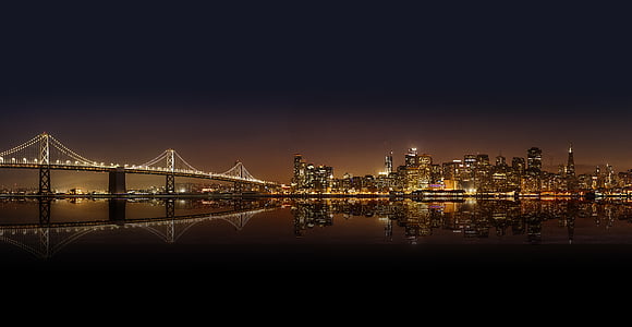 Panoramica, fotografia, illuminato, Ponte, edifici, riflettendo, acqua