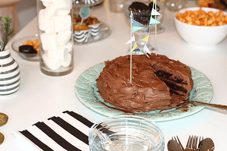 chocolate, cake, marshmallows, glass, cutlery, cake server, pennants