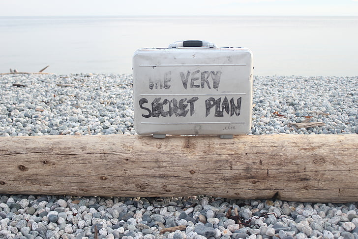 the very secret plan, briefcase message, log on beach