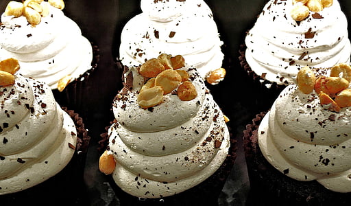 chocolate cupcake, whipped cream, peanuts, chocolate, dessert, food, food and drink