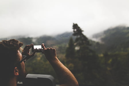 man, mountain, outdoors, person, taking photo