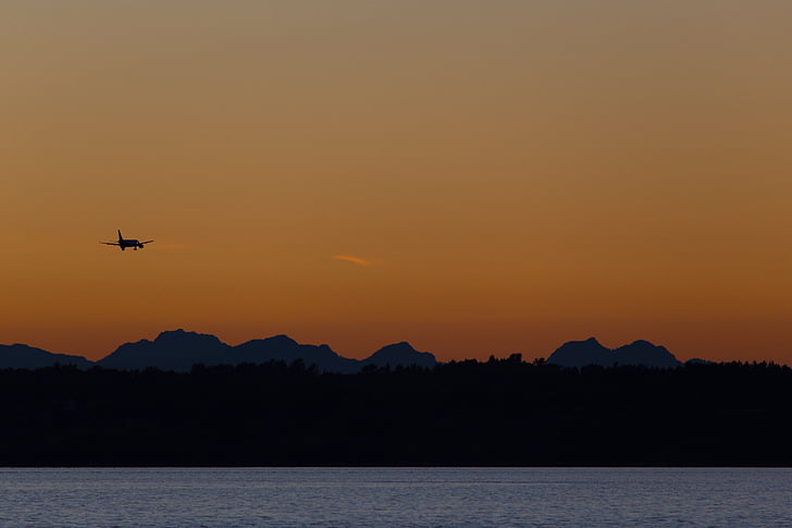 silhouette, plane, flight, hills, orange, sky, water