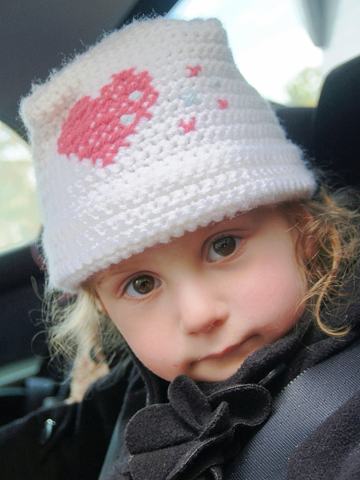 girl, little, brown eyes, solemn, hat, heart, crochet