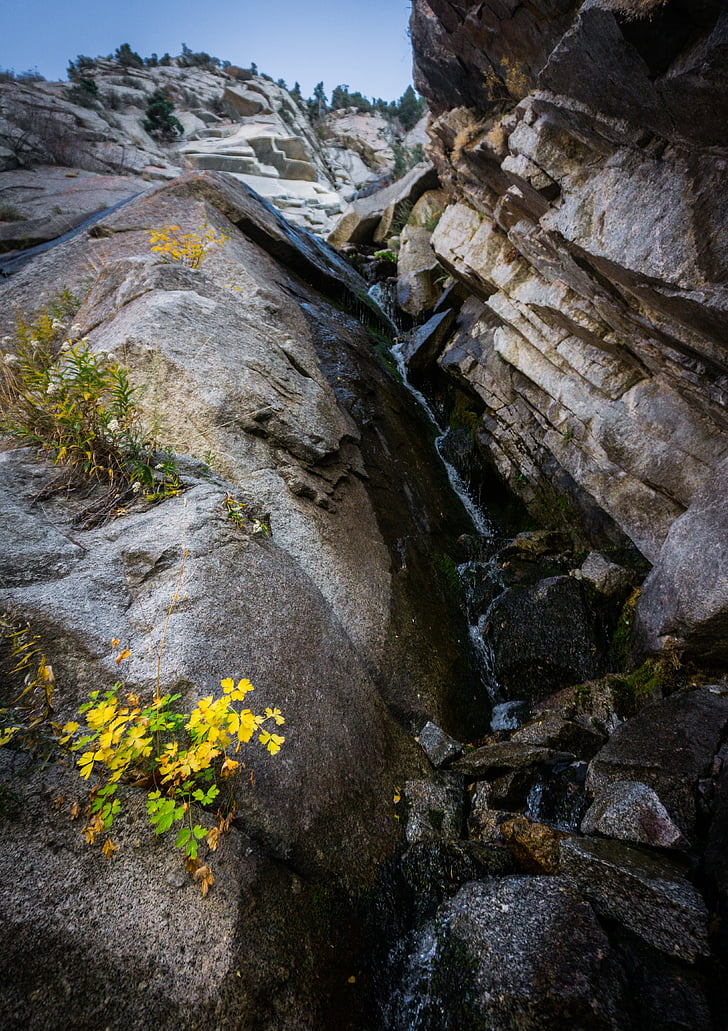 low, angle, photography, waterfall, brown, formation, rocks