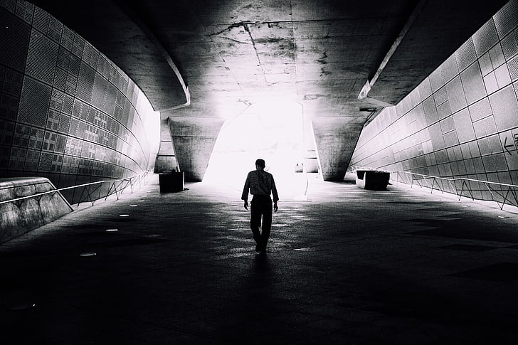gray, scale, photo, man, walking, tunnel, black and white
