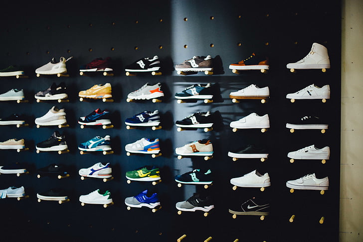 assorted, unpaired, shoes, displayed, wall, business, city