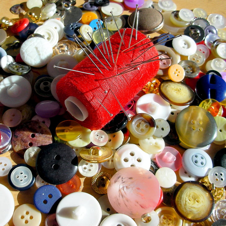 a lot, buttons, spool of thread, red, needles, pins, decoration