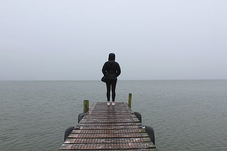 woman, black, hoodie, standing, brown, wooden, dock
