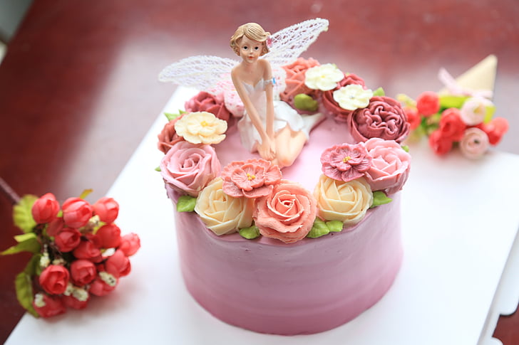a tortát díszítő, torta, édes, krém, angyal, virág, West point