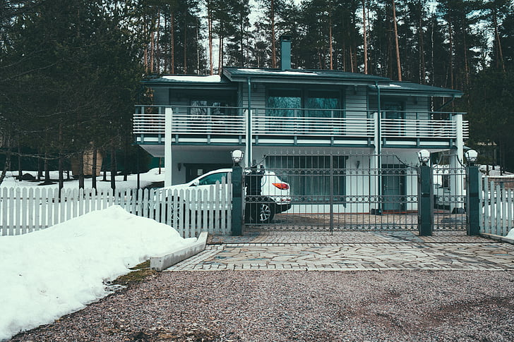 white, suv, parked, inside, black, gate, house