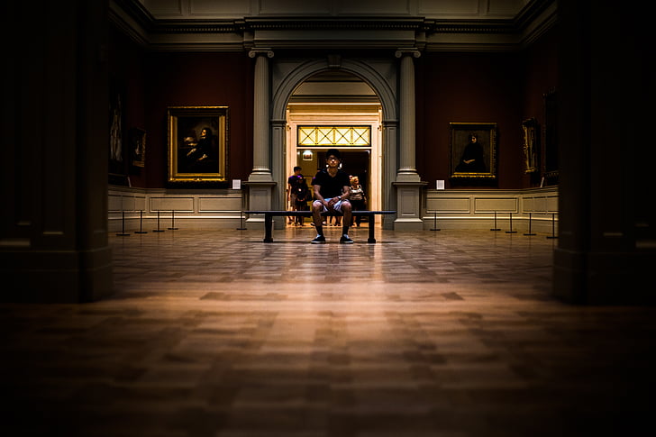 people, man, sitting, alone, museum, building, establishment