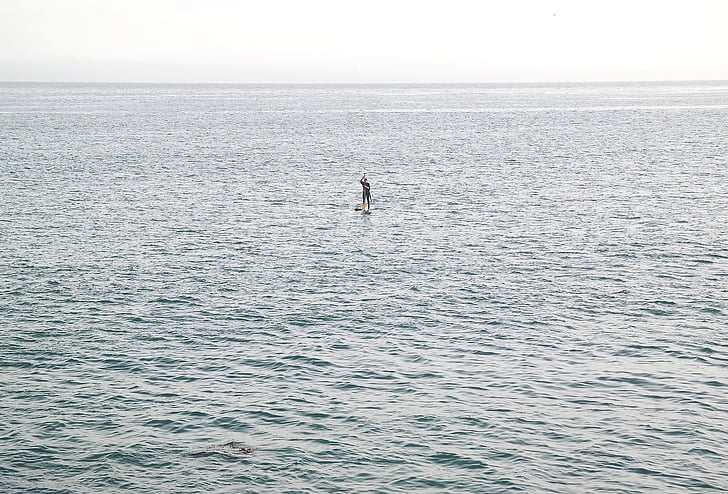 person, surfboard, middle, body, water, gray, white