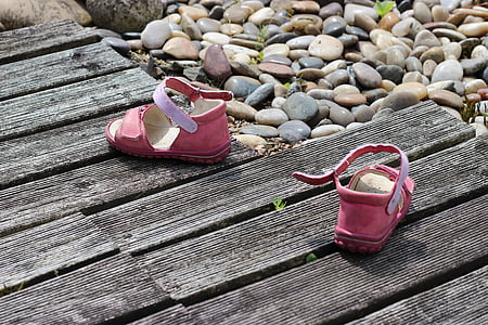 children's shoes, way, childhood, past, wood, stones, border