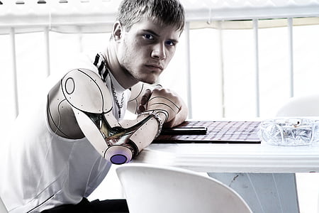 man, robotic, arm, sitting, front, o, white
