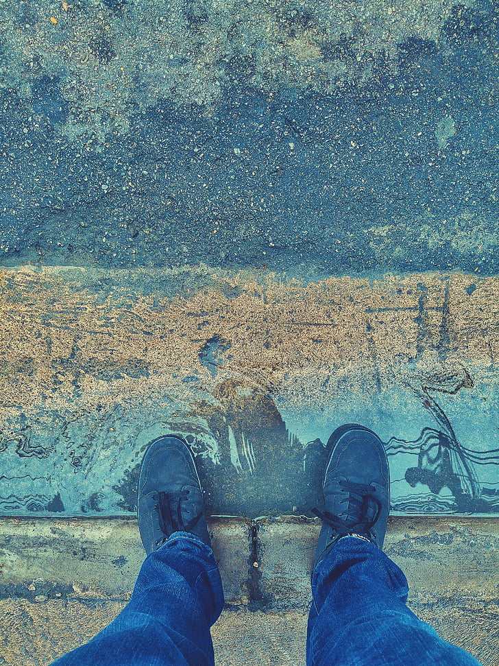 footwear, pavement, puddle, shoes, sneakers, water