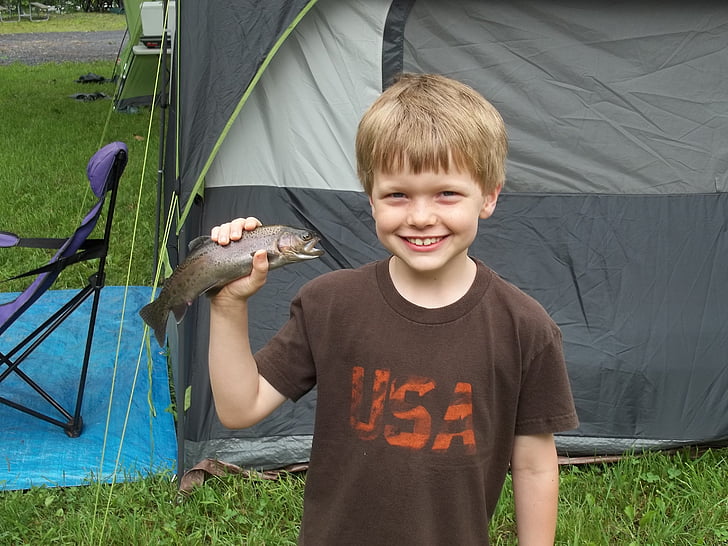 happy boy, boy with fish, summer camp, summer vacation, fishing trip, fishing, tent