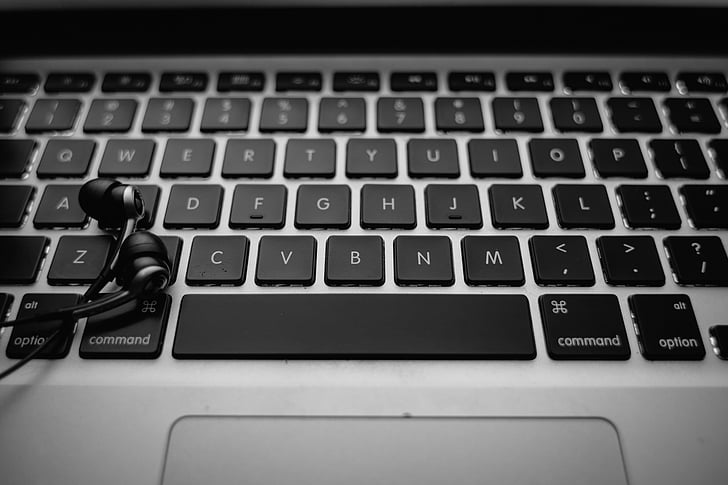 apple, black and-white, computer, earphones, electronics, keyboard, laptop