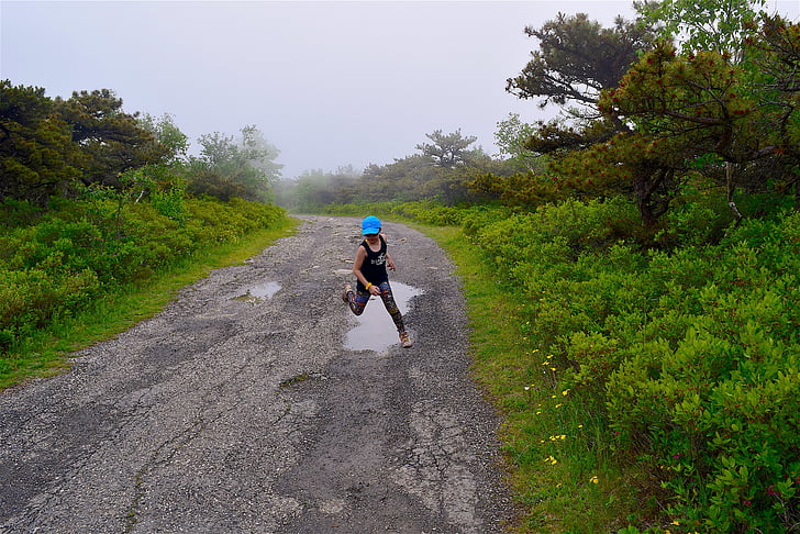 girl, running, puddle, trail, road, fog, mist