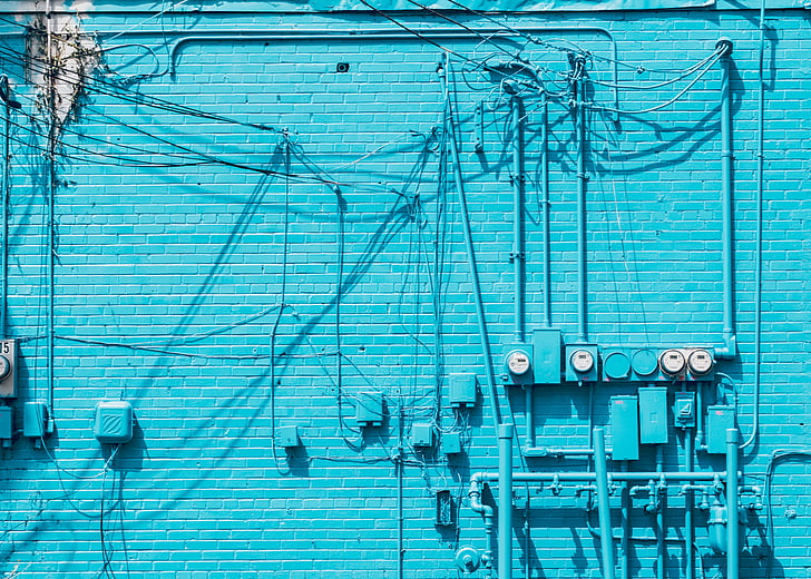 buildings, bricks, blue, pipes, wirings, meters, wall