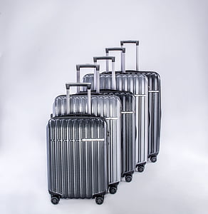 luggage, travel case, metallic lugguage, silver colored, white background, no people, business