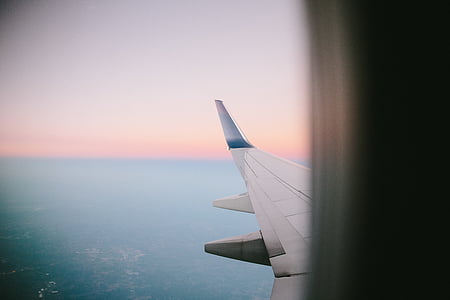 white, airplane, wing, daytime, water, horizon, plane