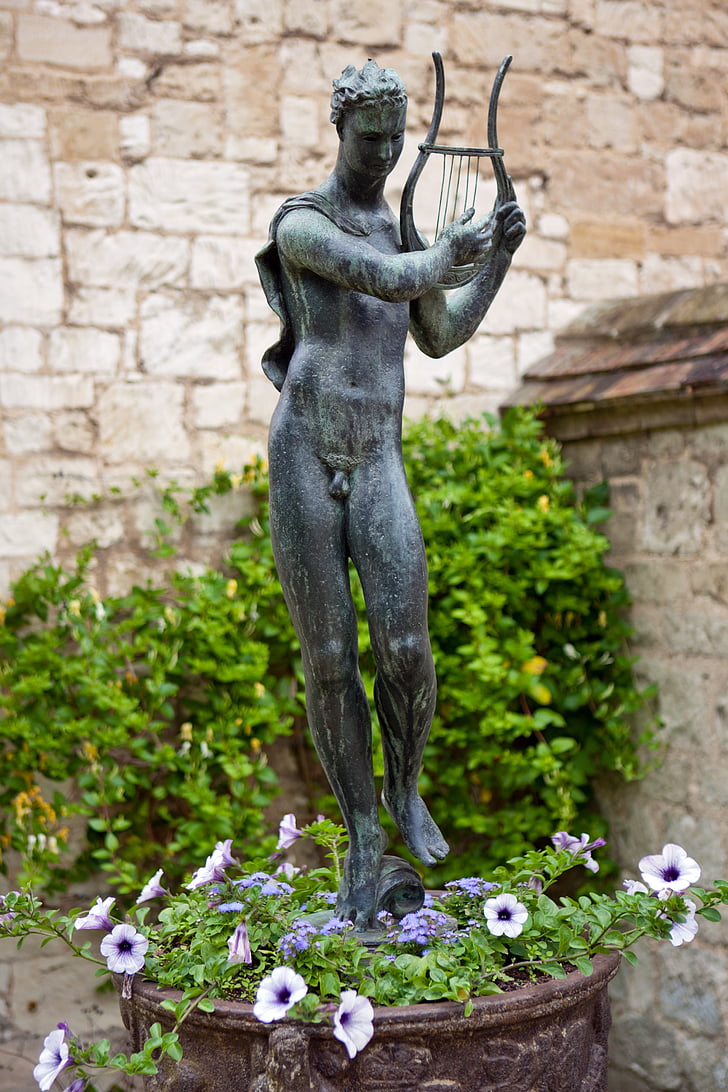 bronze statue, male, nude, playing, lyre, walled garden, classic