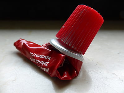tube, toothpaste, aluminium, red, empty, depleted, depressed