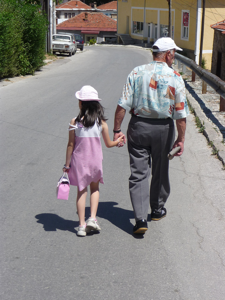 grandfather, girl, handbag, hold hands, walk, bsck view, together