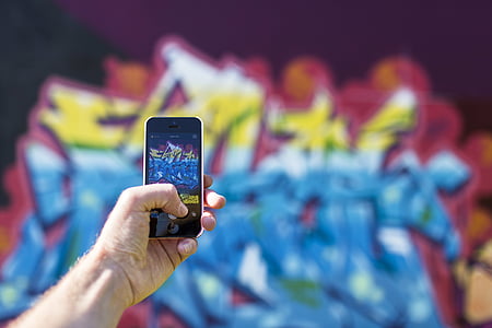 person, taking, photo, graffiti, wall, art, iphone