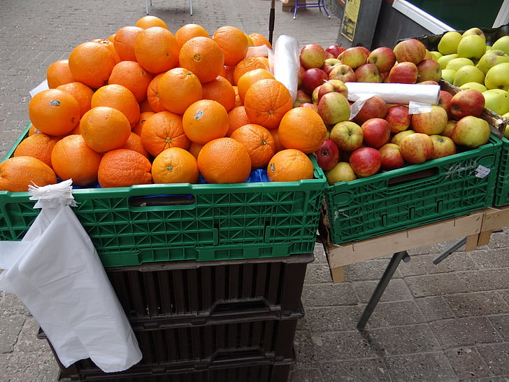 oranges, apples, fruit, greengrocer, fruit boxes, outdoor, plastic bags