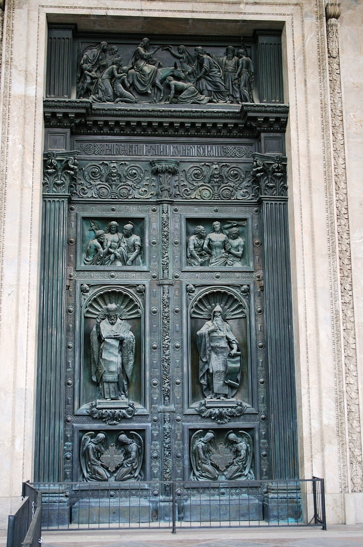 door, large, tall, heavy, decorated, relief, ornate