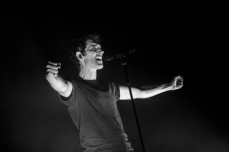 adult, concert, dark, entertainer, hands, man, microphone