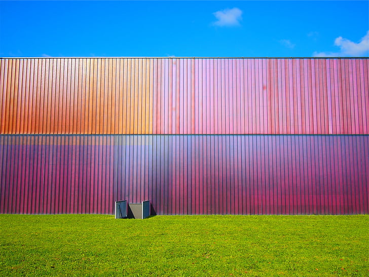 multicolored, wall, blue, skies, surrounded, green, grass