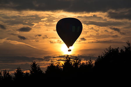 balloon flight, balloon, sun, sunset, forest, sky, orange